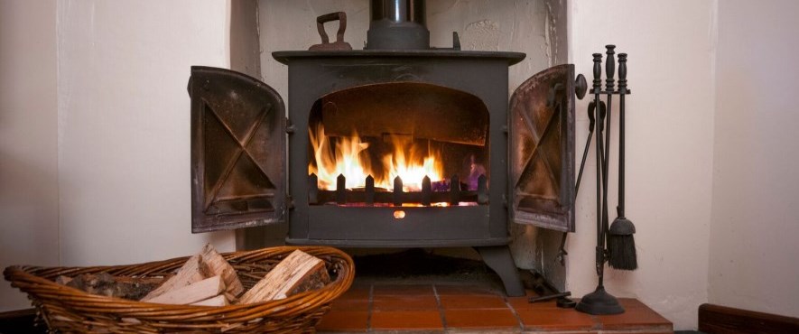wood burning stove with fire inside