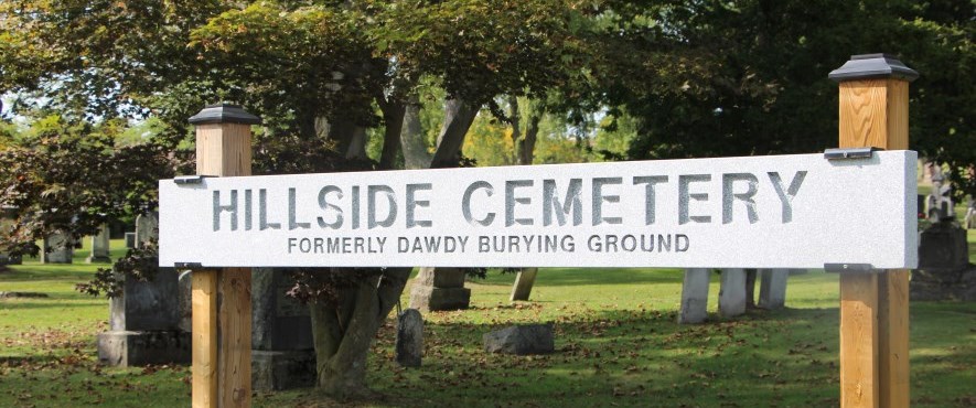 hillside cemetery entry sign