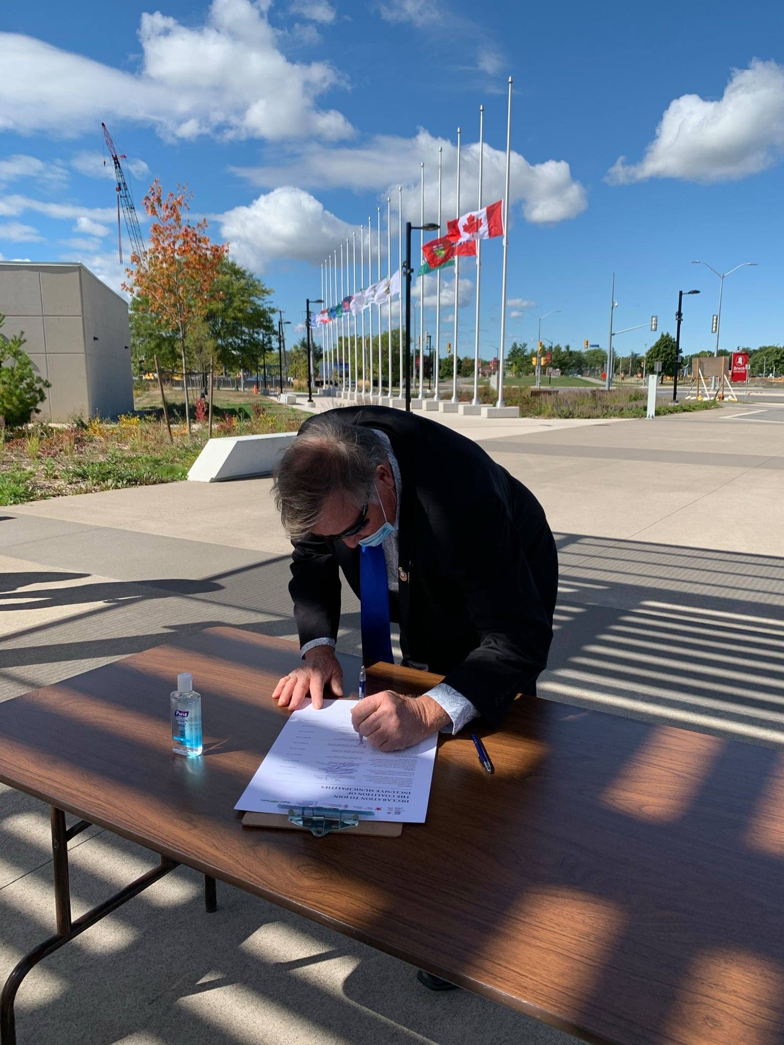 mayor marvin junking signing paper