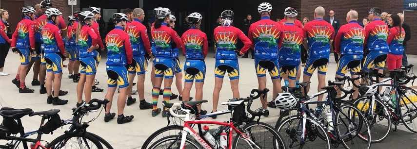 A group of cyclists preparing to cycle